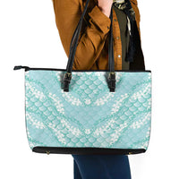 Light Turquoise Mermaid Puakenikeni Maile Lei Leather Tote Bag
