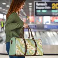 Liko Kukui Hawai'i Palaka Plumeria Travel Bag Puakenikeni and Maile Lei