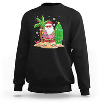 Christmas In Hawaii Sweatshirt Flamingo Float Xmas Palm Tree Surfboard Cute Santa At Beach TS09 Black - Polynesian Pride