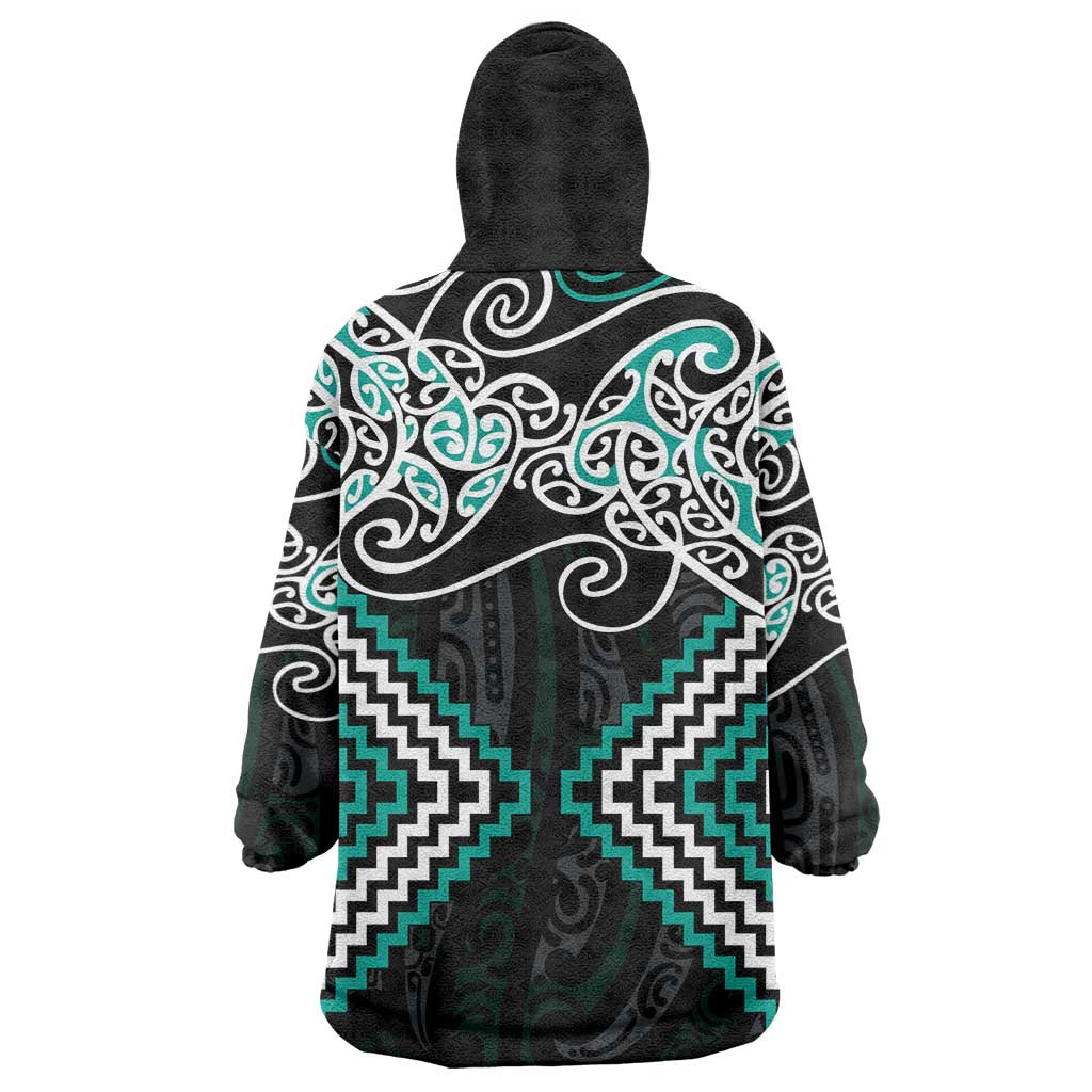 Turquoise Aotearoa Tukutuku Manawa Tapu Wearable Blanket Hoodie Ta Moko Toi Maori