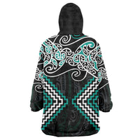 Turquoise Aotearoa Tukutuku Manawa Tapu Wearable Blanket Hoodie Ta Moko Toi Maori