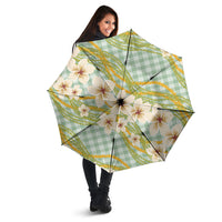 Liko Kukui Hawai'i Palaka Plumeria Umbrella Puakenikeni and Maile Lei