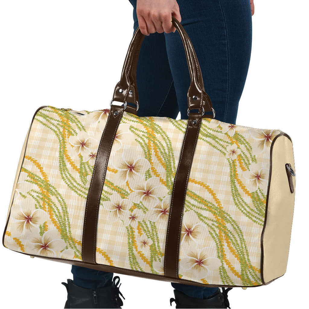Melemele Ahiahia Hawai'i Palaka Plumeria Travel Bag Puakenikeni and Maile Lei